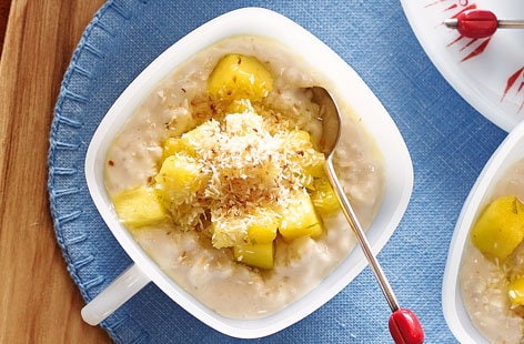 Image of "Coconut rice pudding with pineapple and mango"