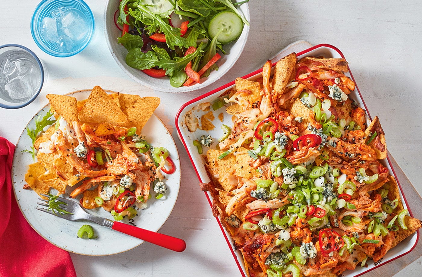 Buffalo-inspired chicken nachos