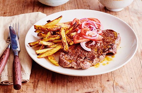 Image of "Steak and chips with salsa"