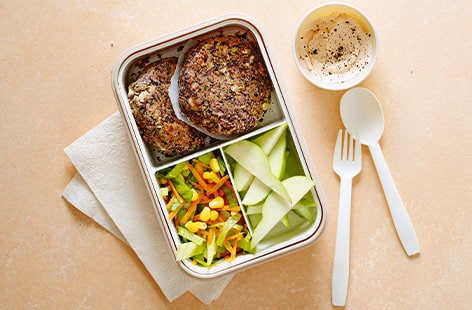 Image of "Bean burgers and carrot salad"
