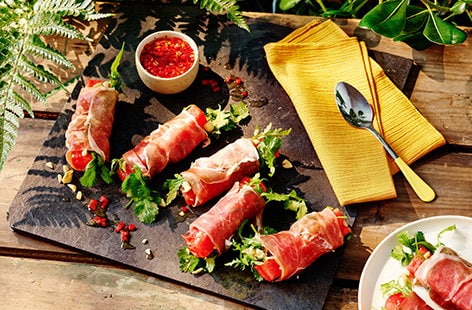Image of "Parma ham, watermelon and peanut summer rolls"