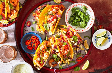 Image of "Spicy prawn, garlic and herb tacos"