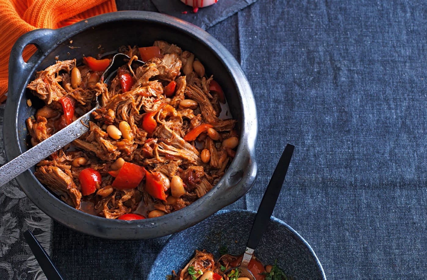 Smoky pulled pork stew with beans, peppers and orange gremolata