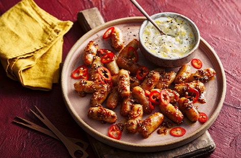 Image of "Sriracha-glazed cocktail sausages"