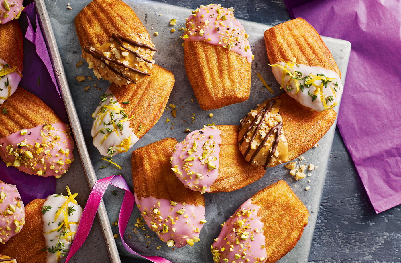 Rosé and pistachio dipped madeleines
