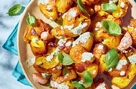 Image of "Smashed potatoes with roasted garlic dip"