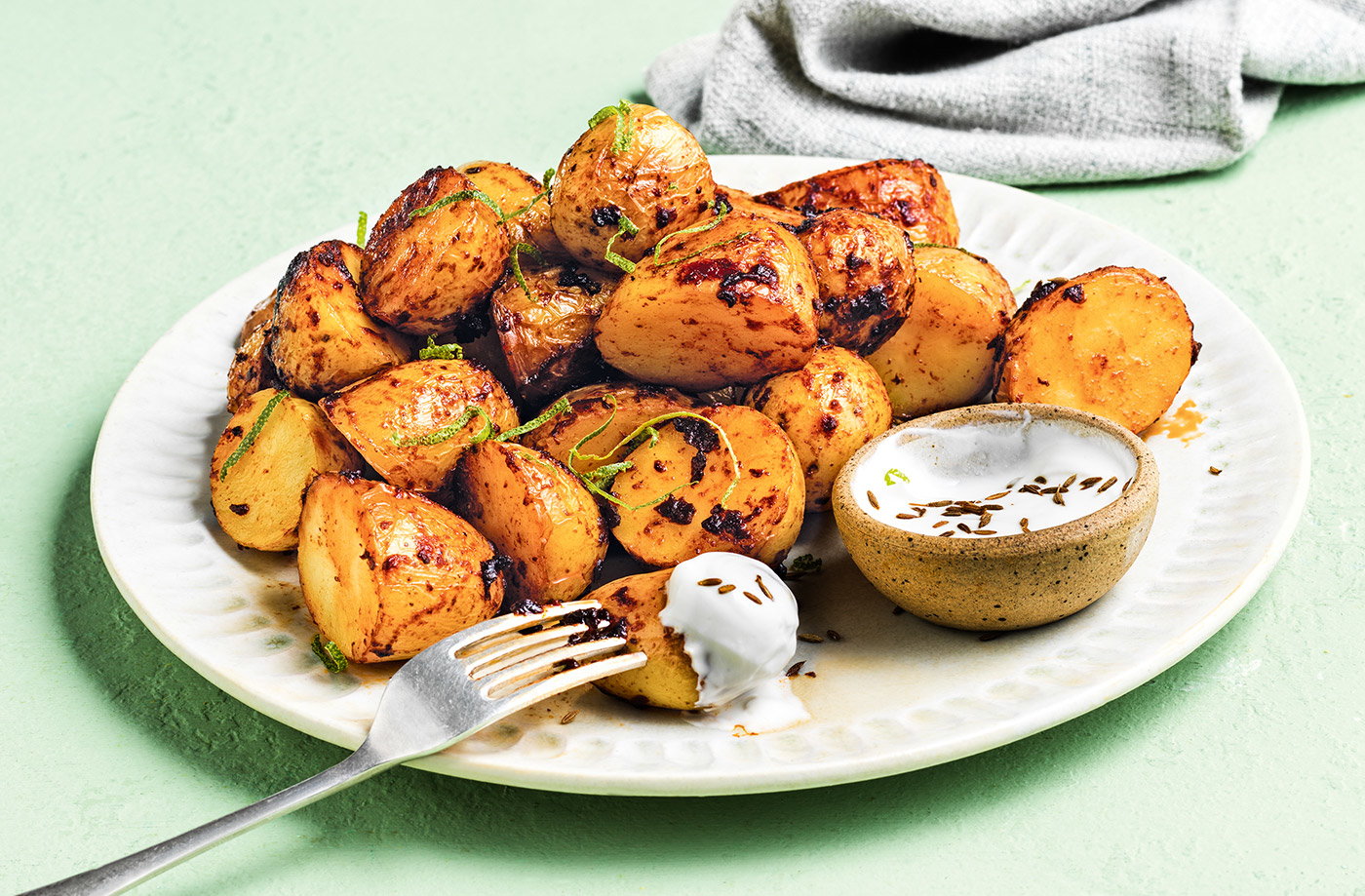 Chipotle-roasted baby potatoes with yogurt dip