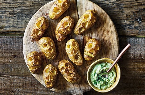 Image of "Shrunken potato heads with slime dip"
