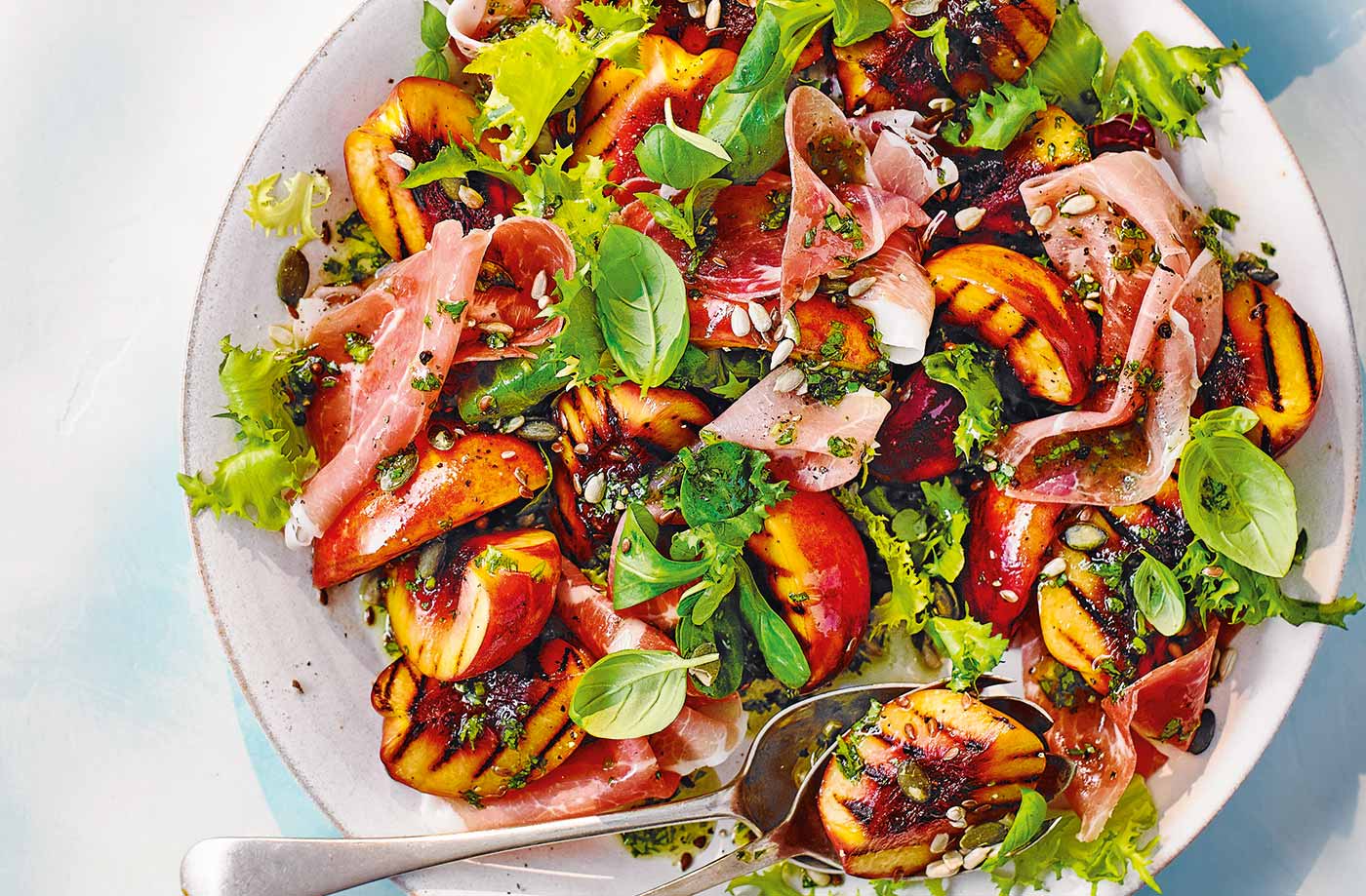 Griddled nectarine and ham salad with basil dressing