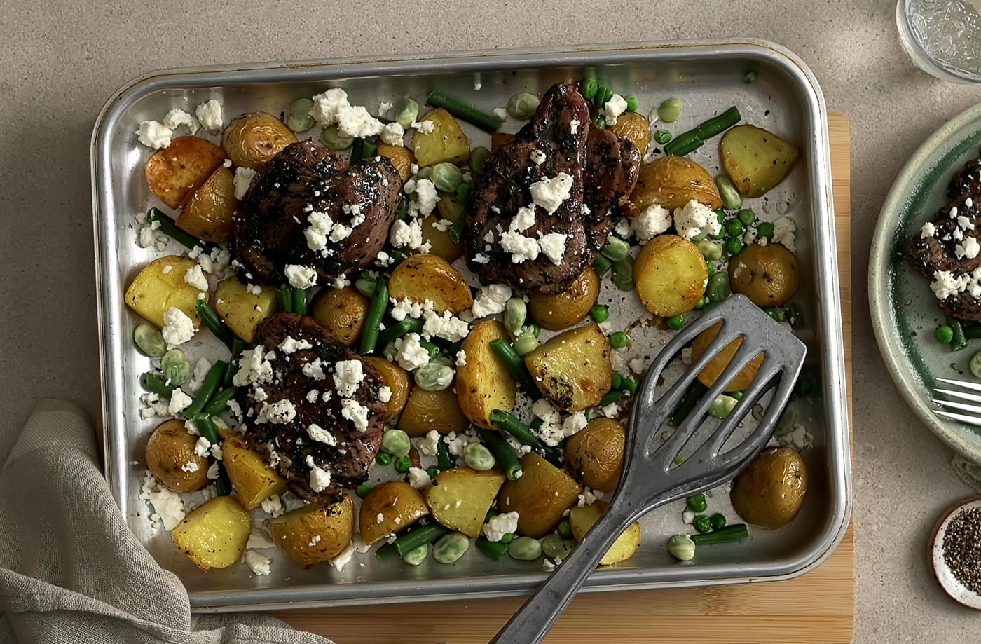 Lamb, mint and spring veg traybake