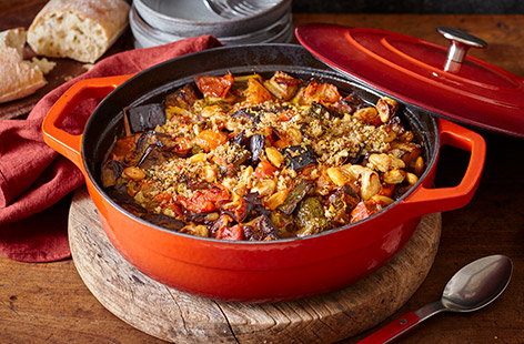 Image of "Aubergine and butter bean stew with walnut pangrattato"