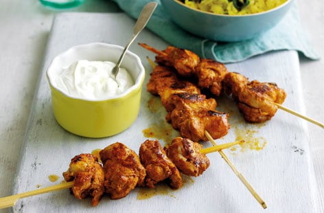 Image of "Spiced chicken skewers with herby rice"