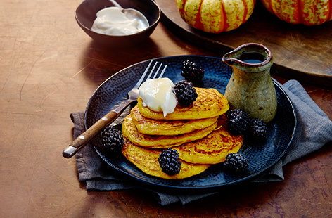 Image of "Sweet pumpkin pancakes with blackberries"