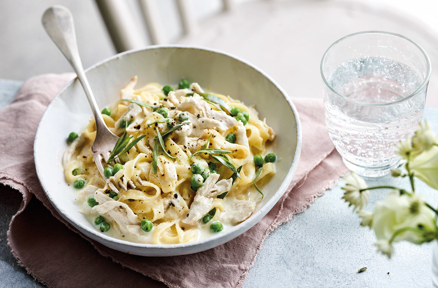 Milk-poached chicken with peas and pasta