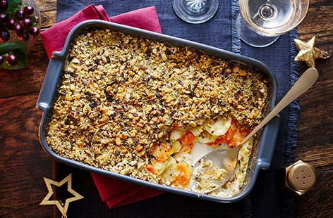 Image of "Carrot and parsnip gratin with stuffing top"