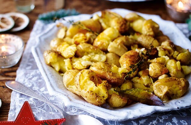 Smashed potatoes with thyme and bay