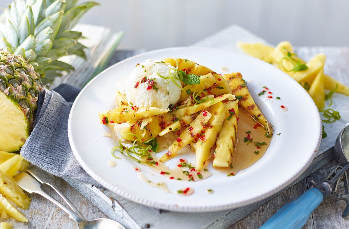 Sticky chilli pineapple with piña colada ice cream