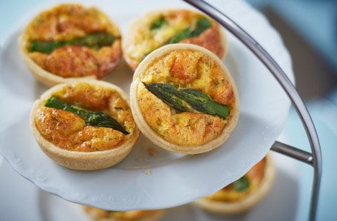 Image of "Mini asparagus and Gruyère quiches"