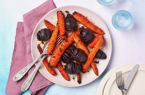 Image of "Sticky hasselback beetroot and carrots"