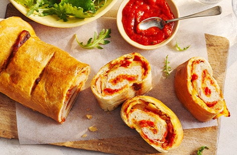 Image of "Ham and pineapple pizza roll"