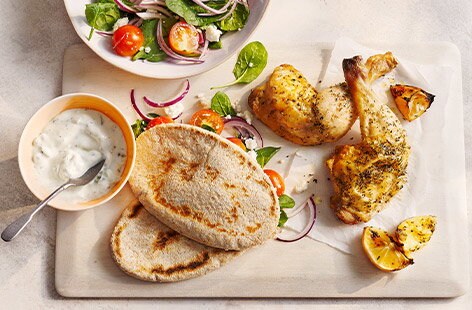 Image of "Greek chicken salad with pitta"