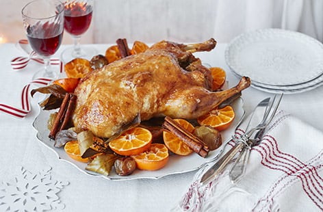 Image of "Spiced roast duck with clementines and a maple and mustard glaze"