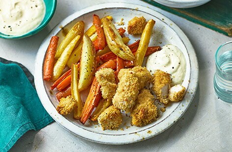 Image of "Couscous chicken nuggets and rainbow chips"