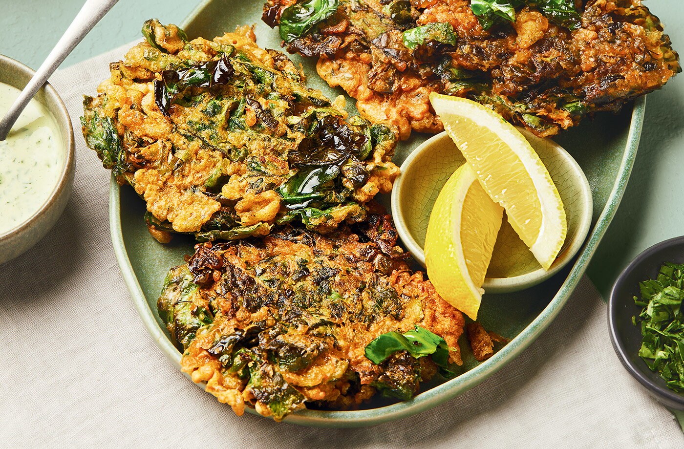 Spring greens fritters with tahini sauce