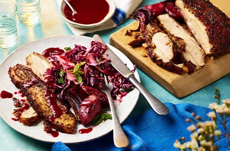 Image of "Slow-roast pork belly with sticky red onions and plum sauce"