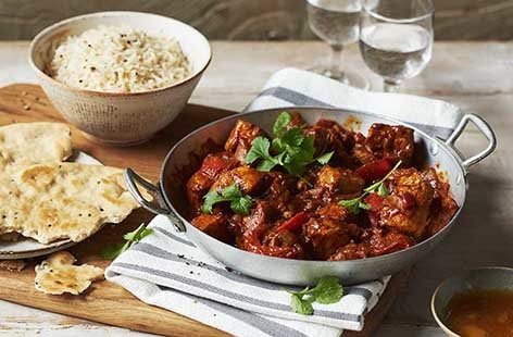 Image of "Chicken and tomato spiced curry"