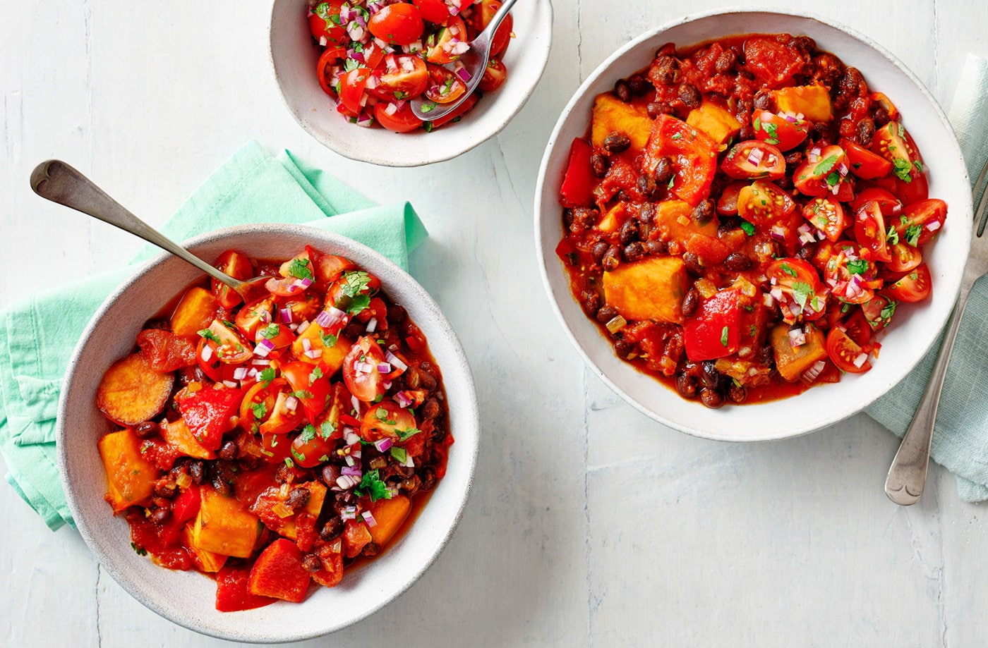 Sweet potato and black bean chilli bowls with cherry tomato salsa