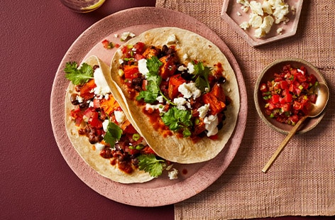 Image of "Chipotle black bean and sweet potato tacos"