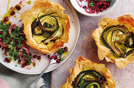 Image of "Charred leek and goat's cheese tartlets"
