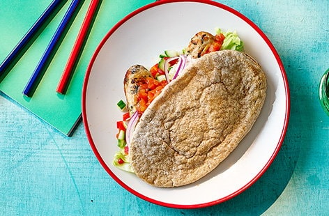 Image of "Quick turkey koftas and pitta with crunchy veggies"