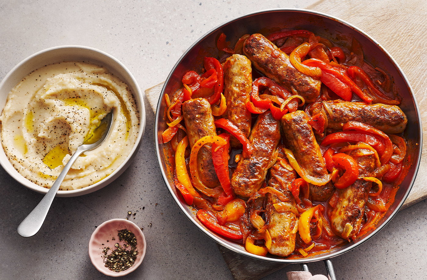 Spicy sausage one-pot with butter bean mash