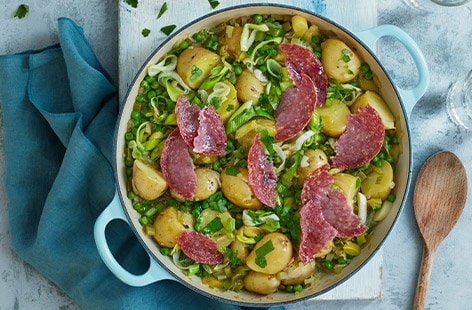 Image of "Pea and potato stew with crispy salami"