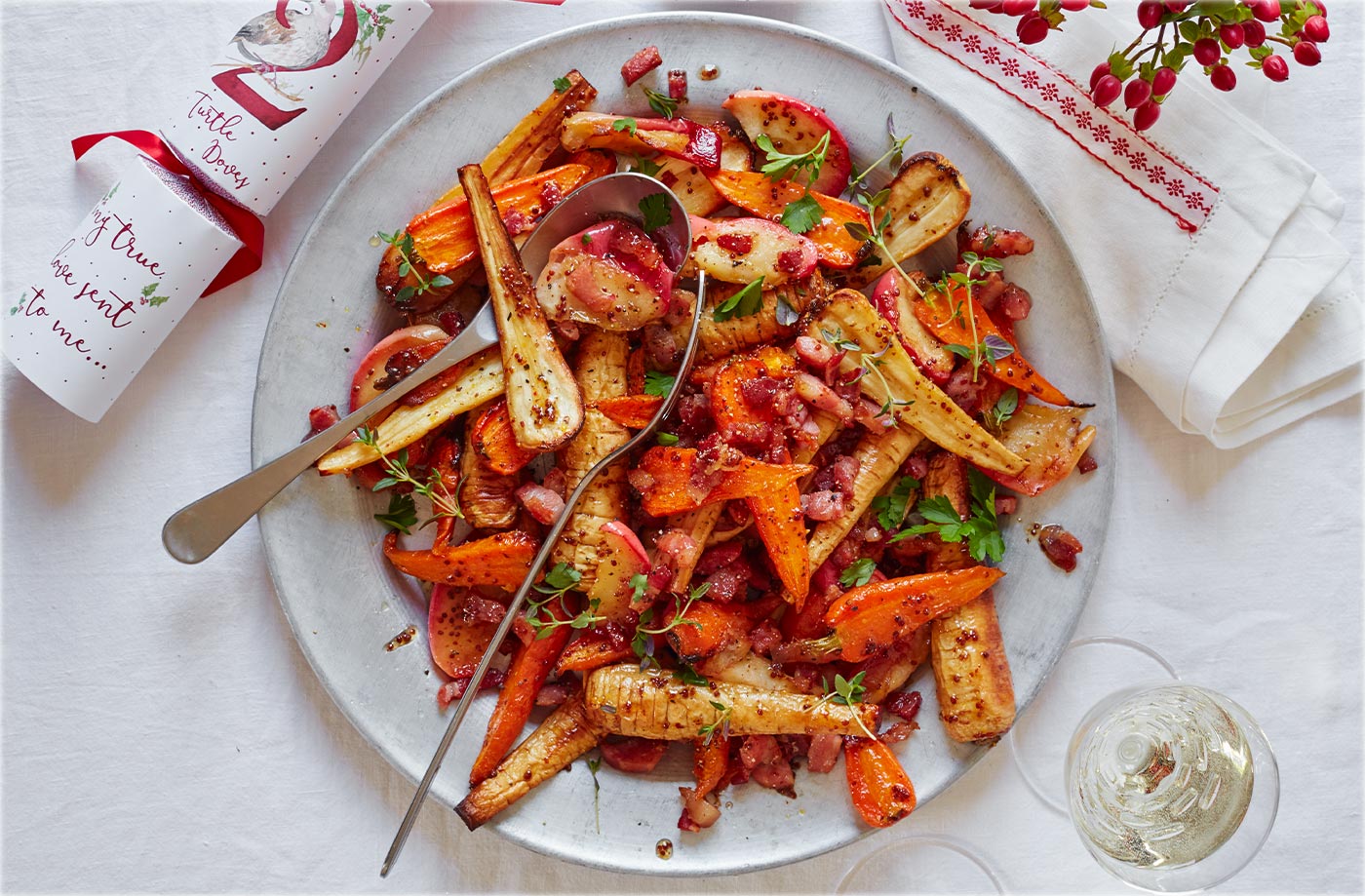 Roasted carrots and parsnips with bacon and apples