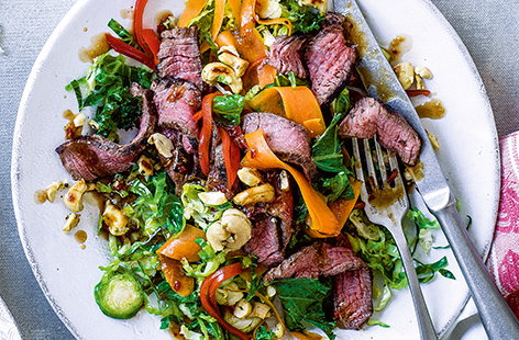 Image of "Thai beef and sprout stir-fry with salt and pepper cashews"