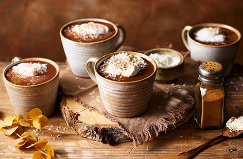 Image of "Coconut hot chocolate with cinnamon and spiced rum"