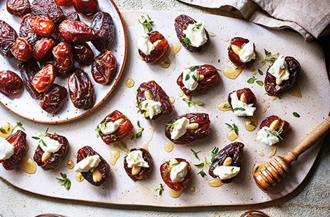Image of "Stuffed dates with goat's cheese and almonds"