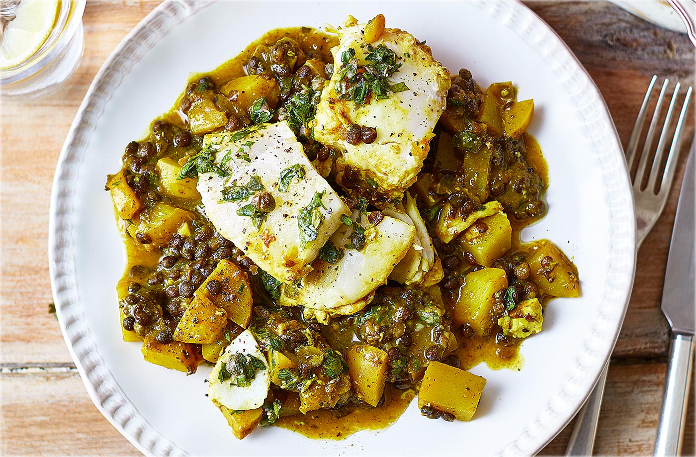 Haddock and lentil stew with green salsa