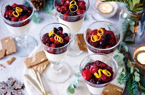 Image of "Creamy eggnog panna cottas with mulled berry compote"