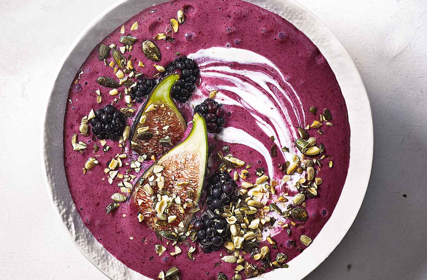 Banana and blackberry smoothie bowls with figs