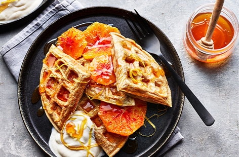 Image of "Wholemeal waffles with sunshine citrus"