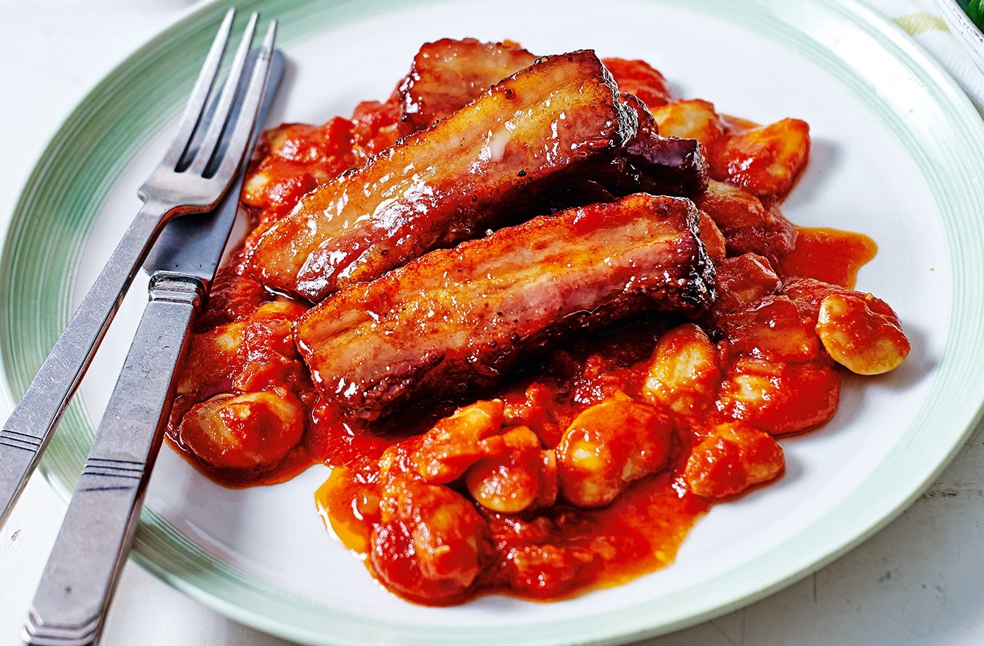 Maple-glazed pork with chilli beans