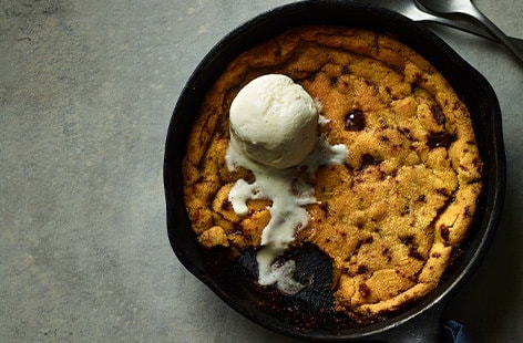 Image of "Vegan choc chip frying pan cookie"