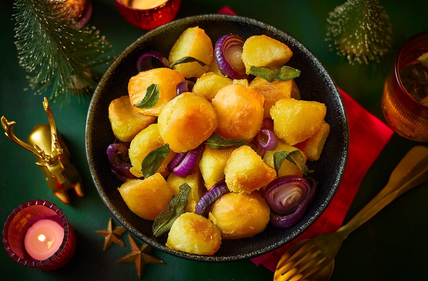 Roast potatoes with sage and red onion