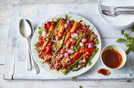 Image of "Spring veg bowl with harissa dressing"