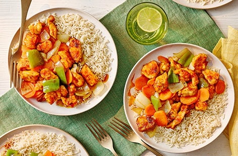 Image of "Chinese-style orange chicken with rice"