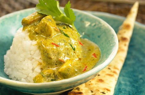 Chicken curry, mustard seeds and rice